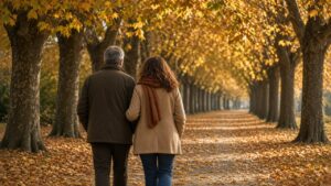 Coppia che cammina in un viale d'autunno: fisioterapia e movimento per il mal di schiena a Lainate